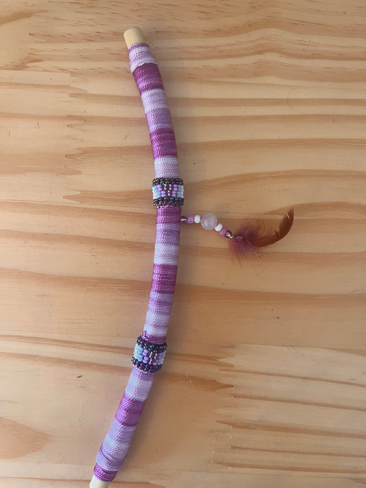 Purple bendable Tepi with feather