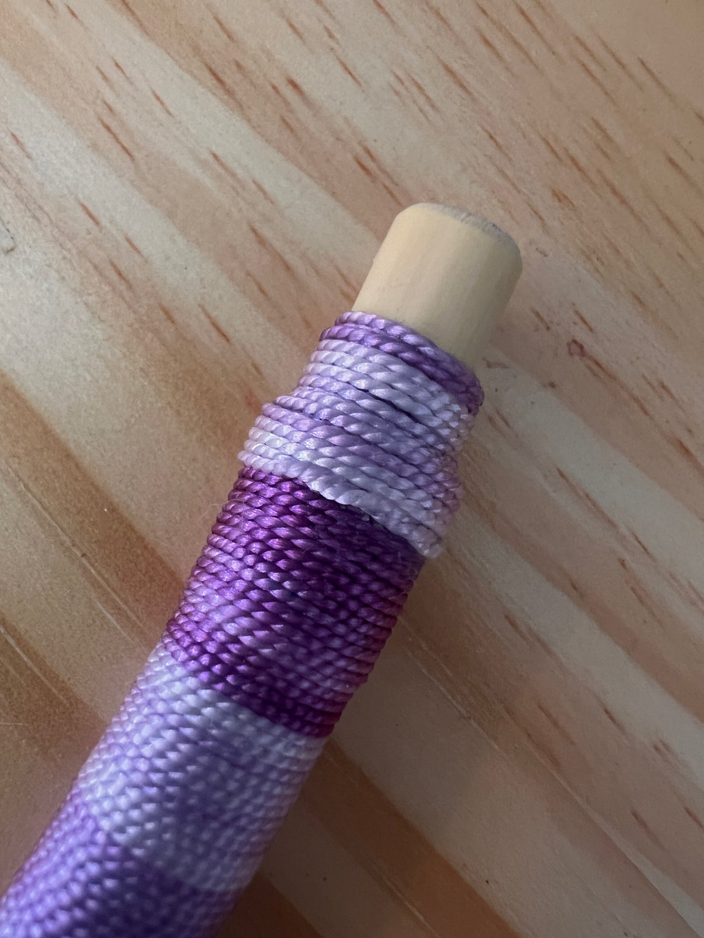 Purple bendable Tepi with feather