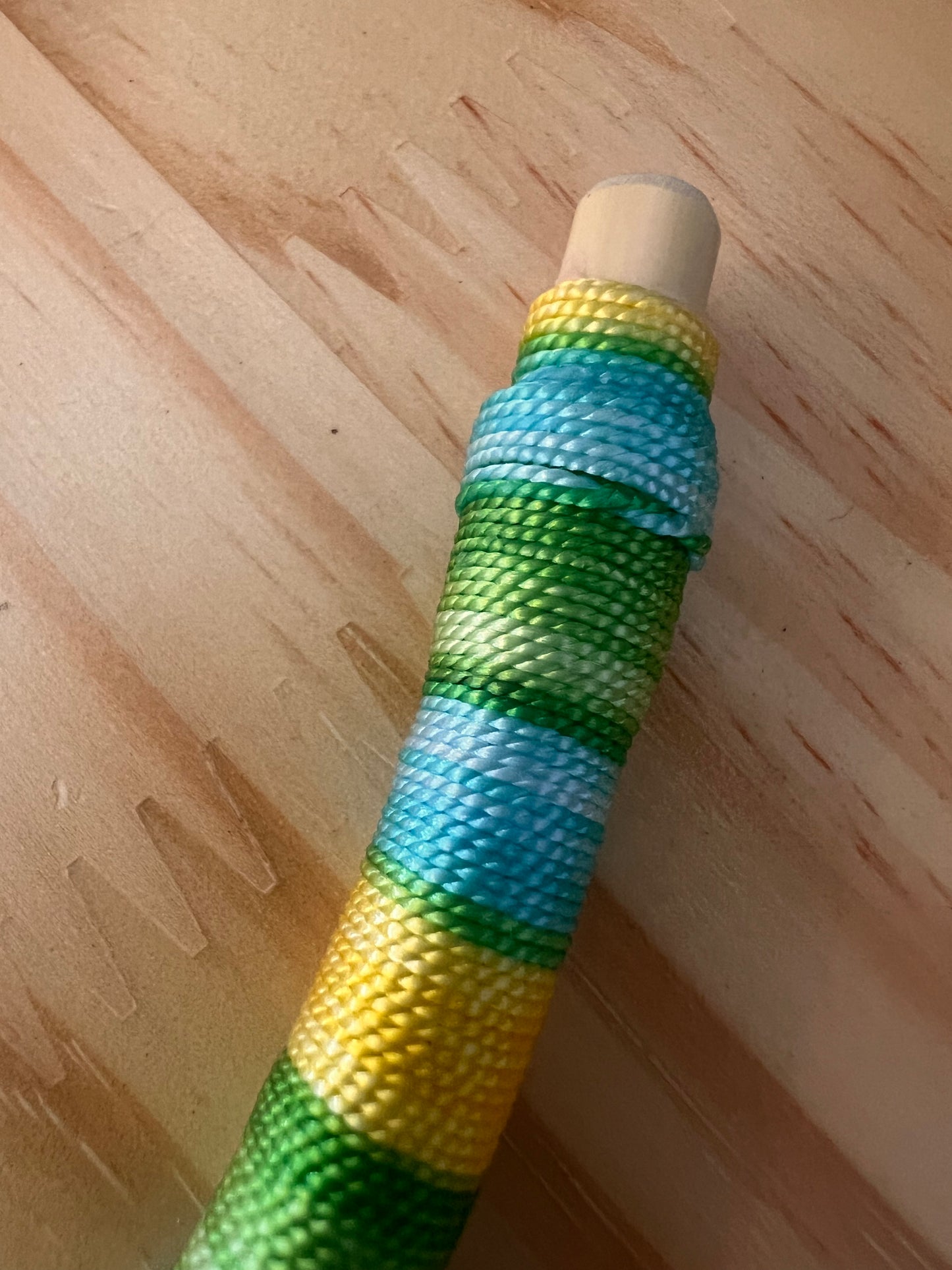 Green bendable Tepi with feather