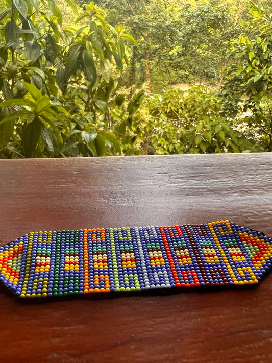 Pulsera celeste con estampados multicolores Inga Kamentsa 4 cm x 15 cm