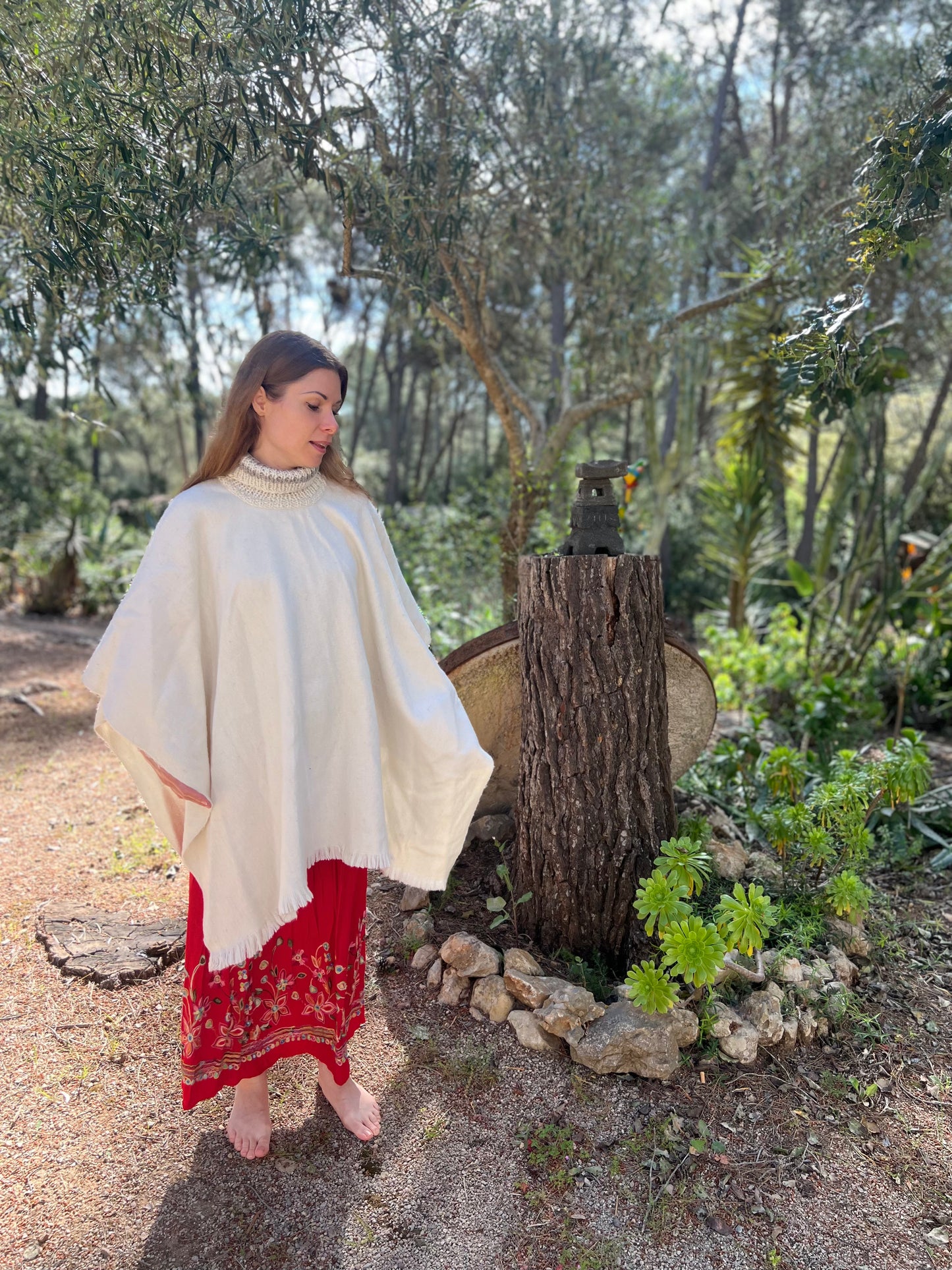 Weißer Winterponcho