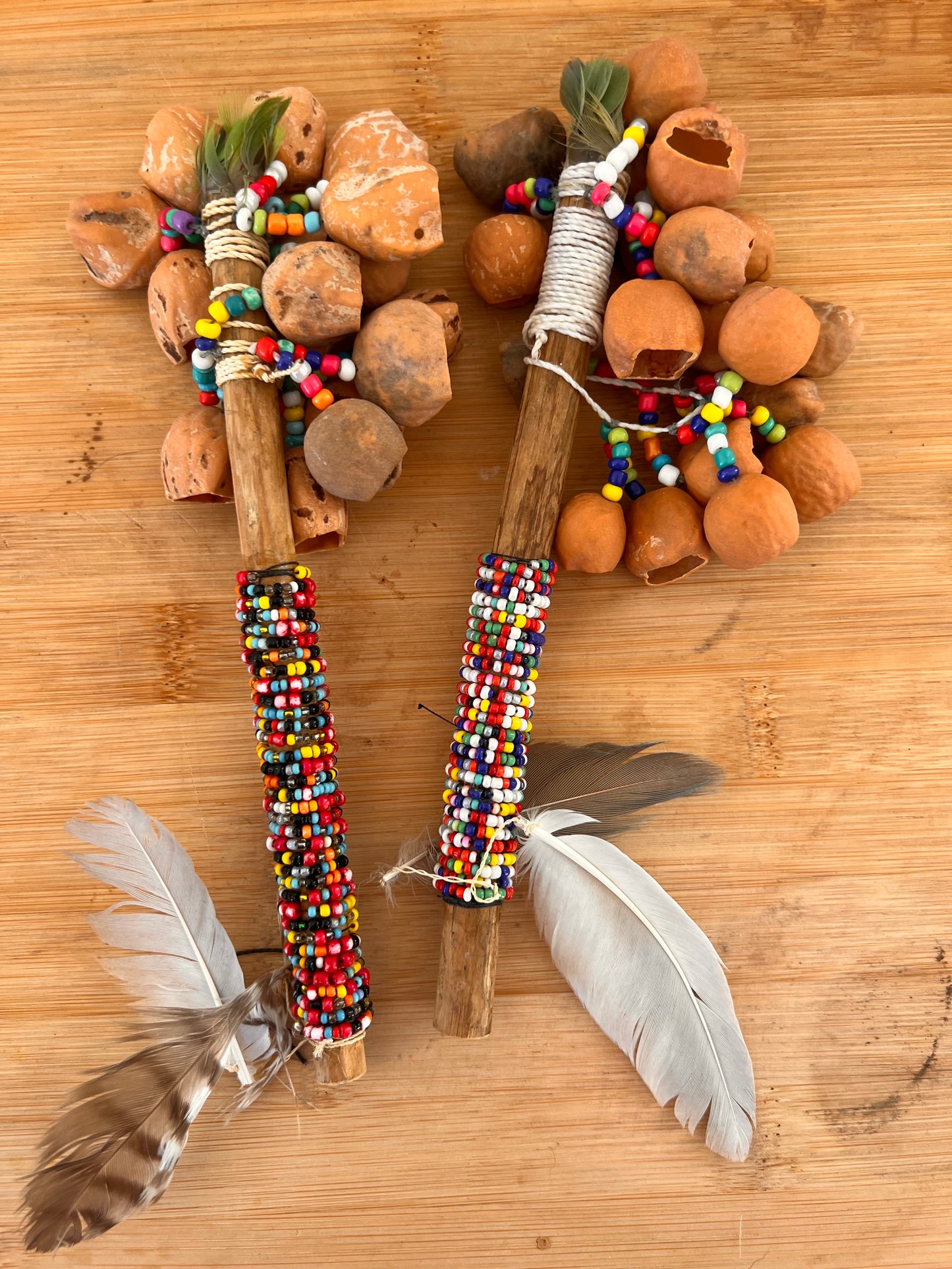 Jungle rattle w/feather cascabeles macho