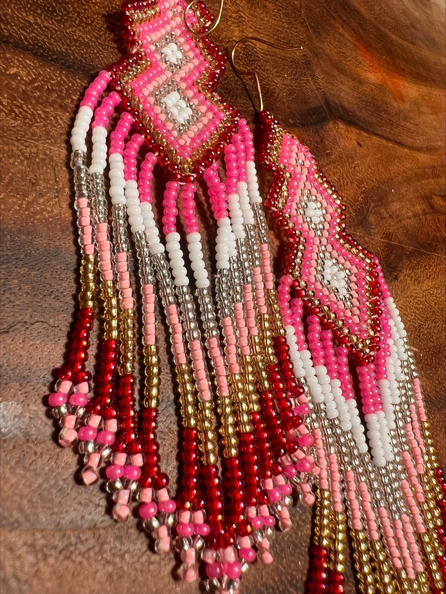 Playful pink long earrings