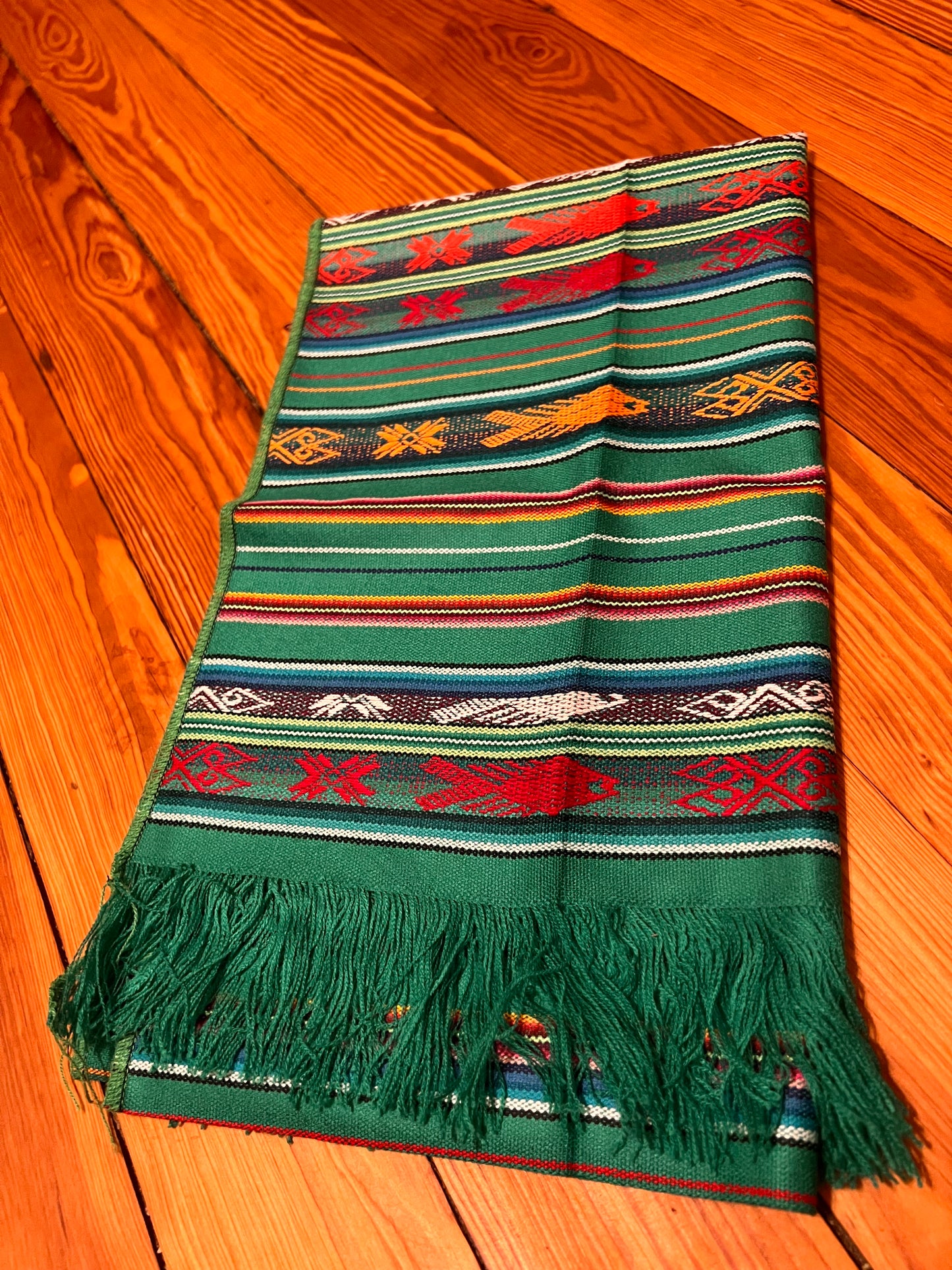 Green table cloth 50 x 160 cm with multicolored patterns