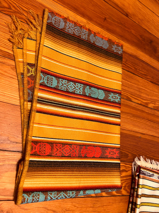 Light brown table cloth 50 x 160 cm with multicolored patterns