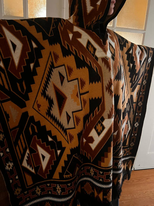 Brown-beige winter poncho with patterns