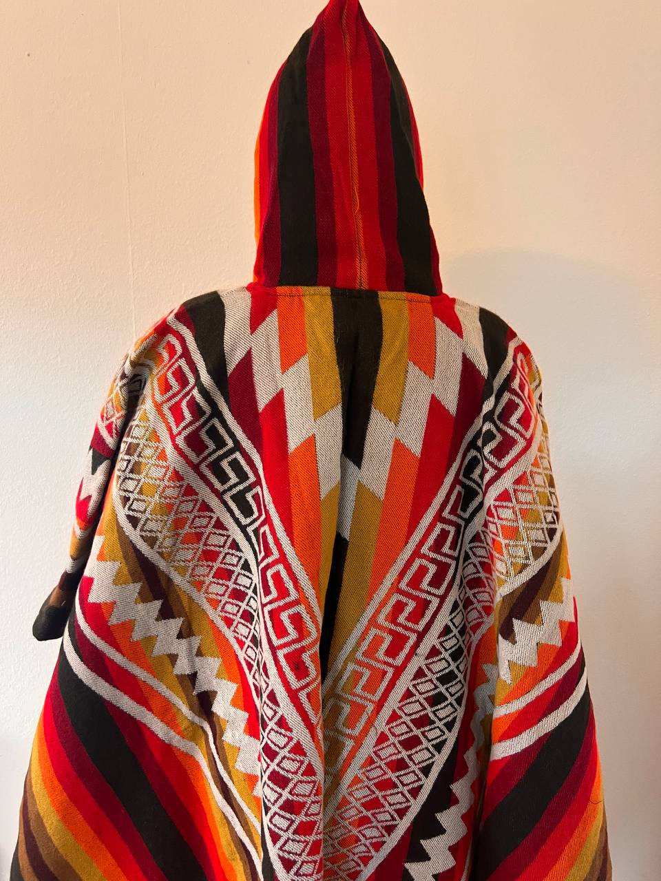 Multicoloured winter poncho
