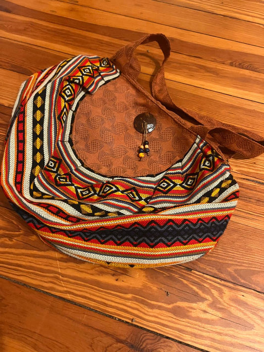 Round multicoloured hand bag