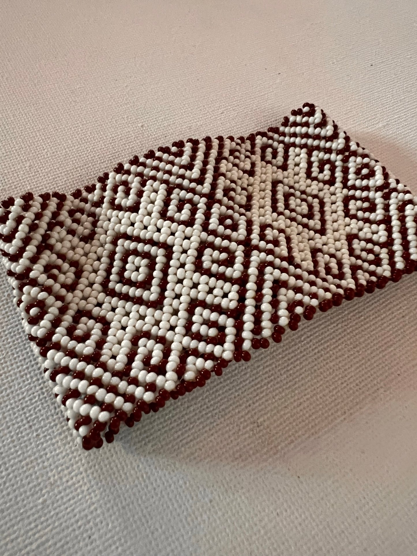 White Huni Kuin bracelet with burgund patterns 5 cm x 18 cm