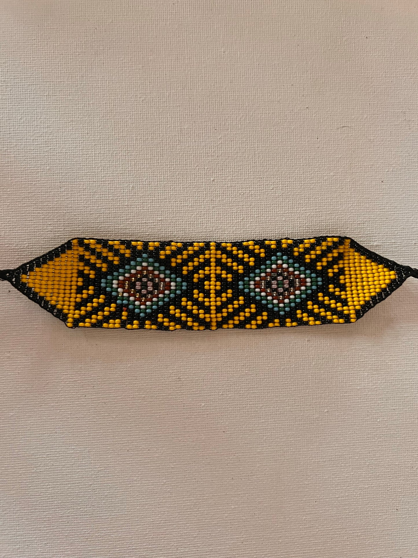 Yellow-black bracelet Yanacona 3 cm x 13 cm