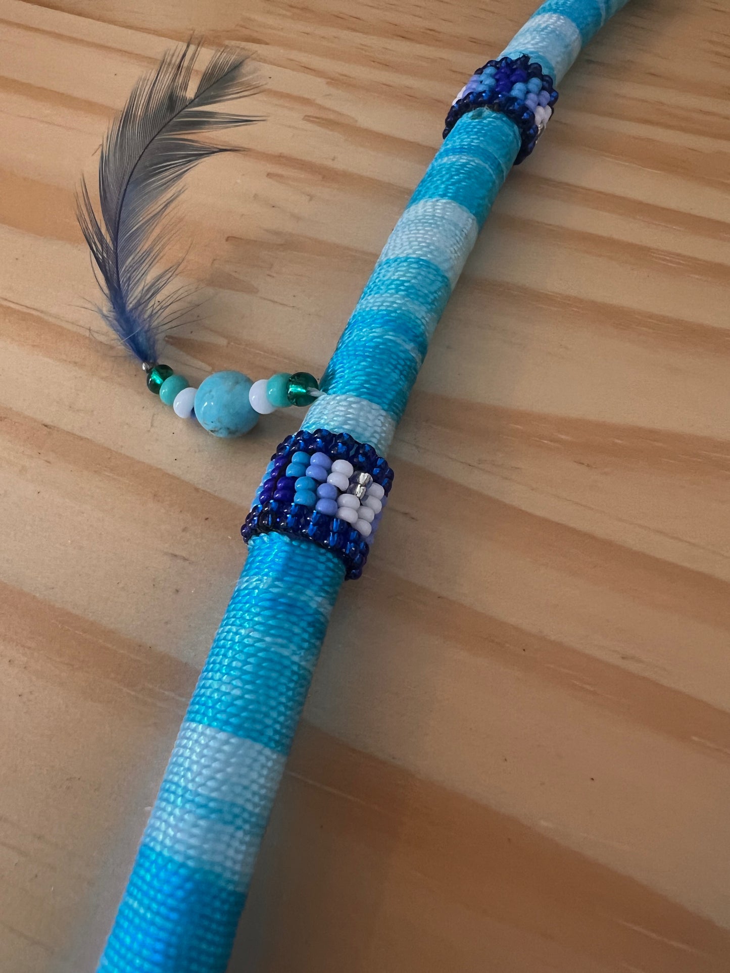 Blue bendable Tepi with feather