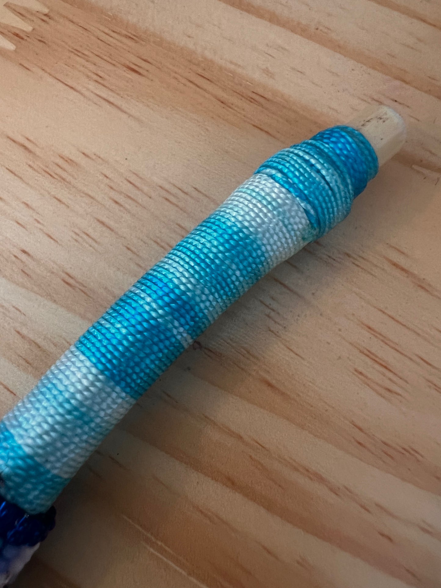 Blue bendable Tepi with feather