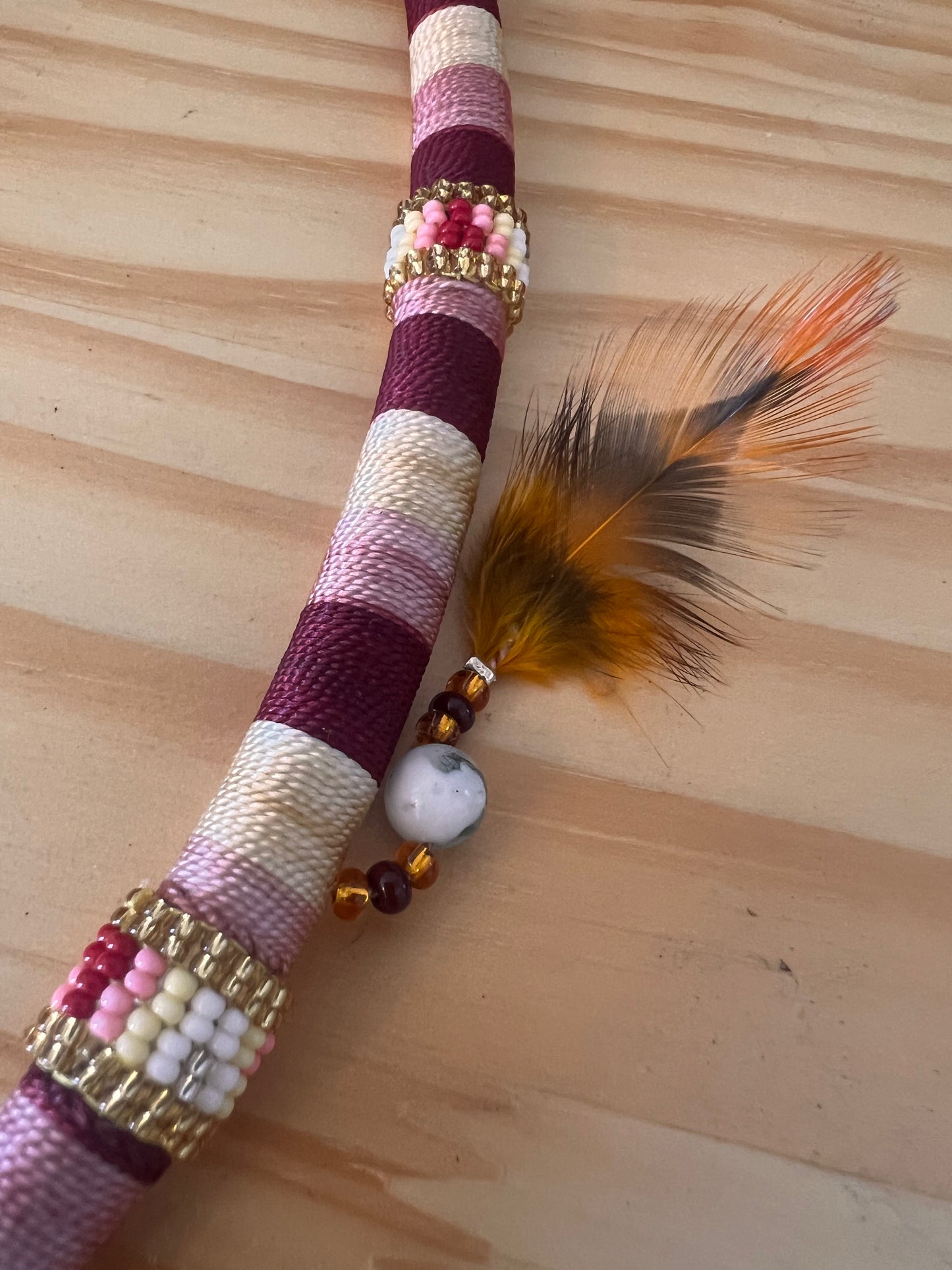 Burgung bendable Tepi with feather