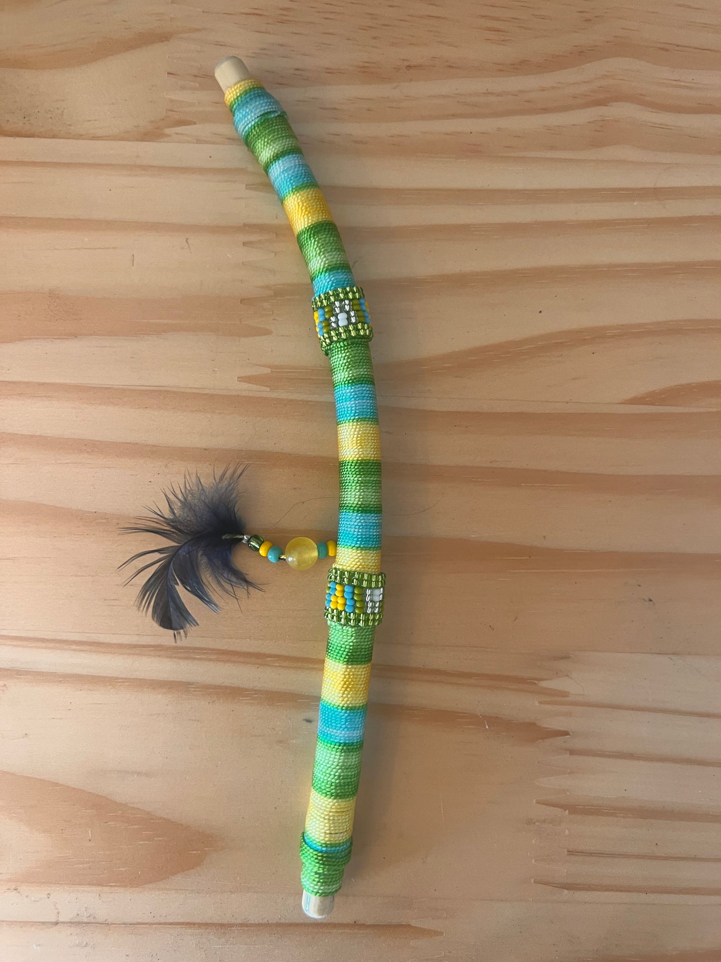 Green bendable Tepi with feather