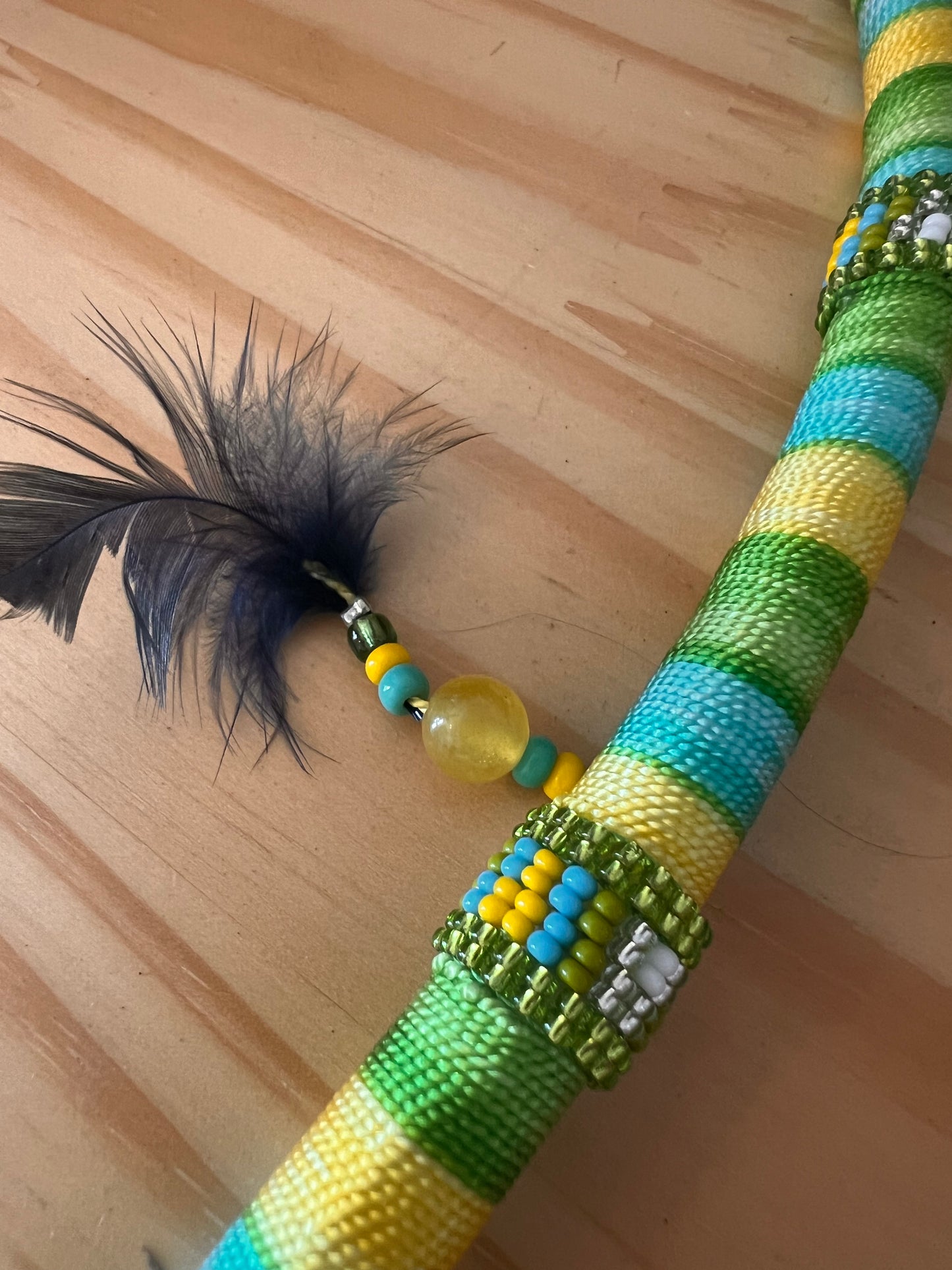 Green bendable Tepi with feather