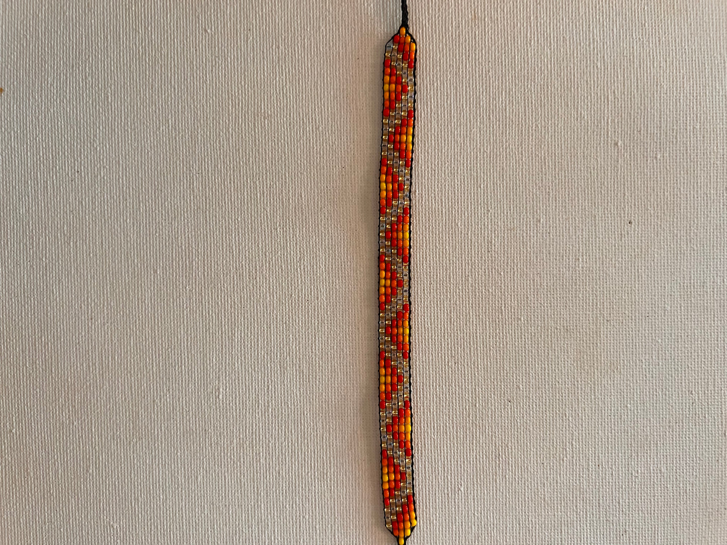 Orange-yellow bracelet with Yanacona 1 cm x 13 cm