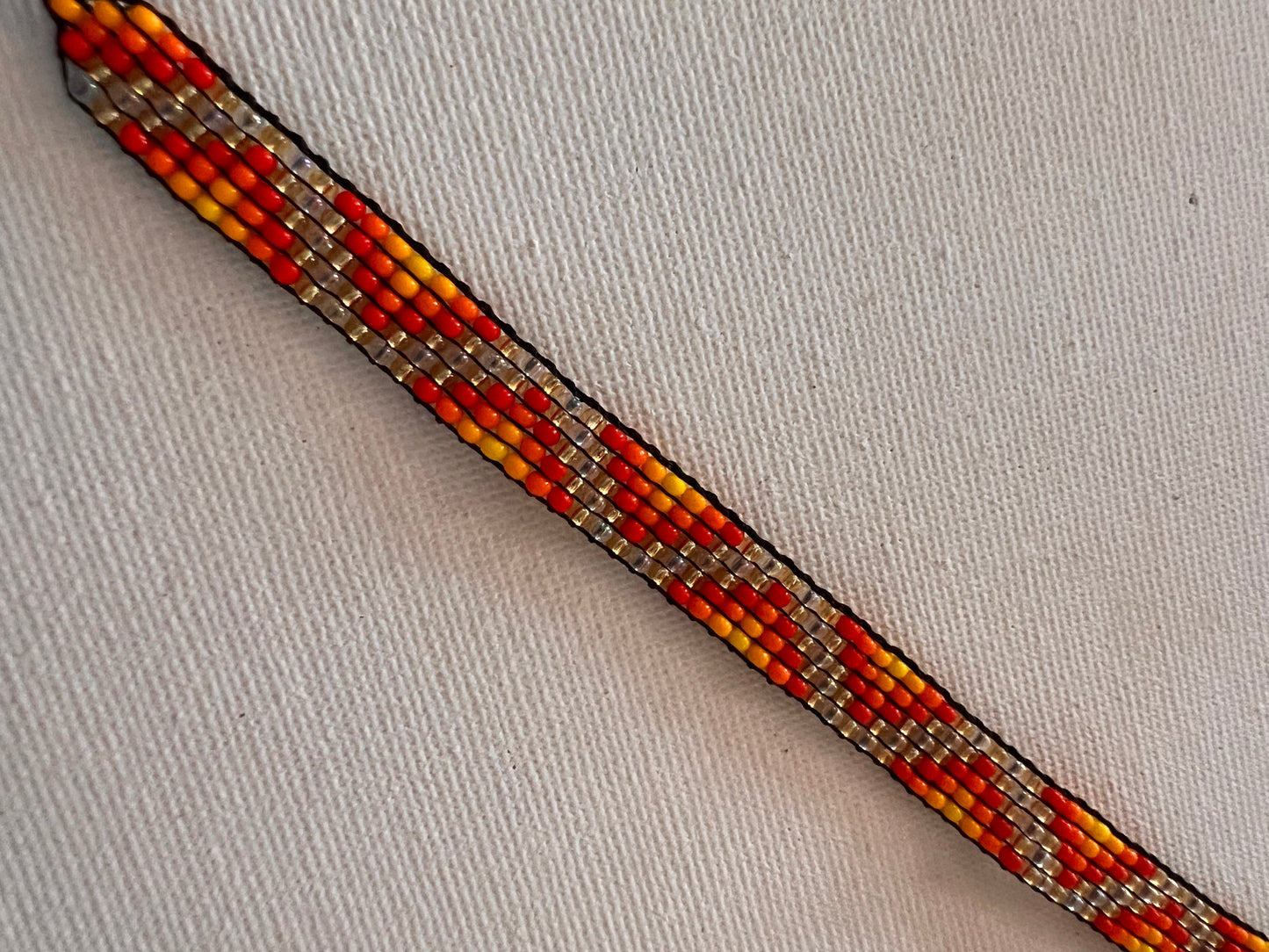 Orange-yellow bracelet with Yanacona 1 cm x 13 cm