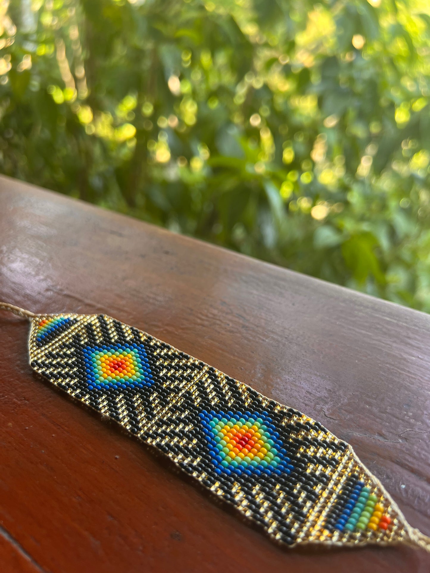 Beige-black bracelet with multicoloured patterns Inga Kamentsa 3,5 cm x 14 cm