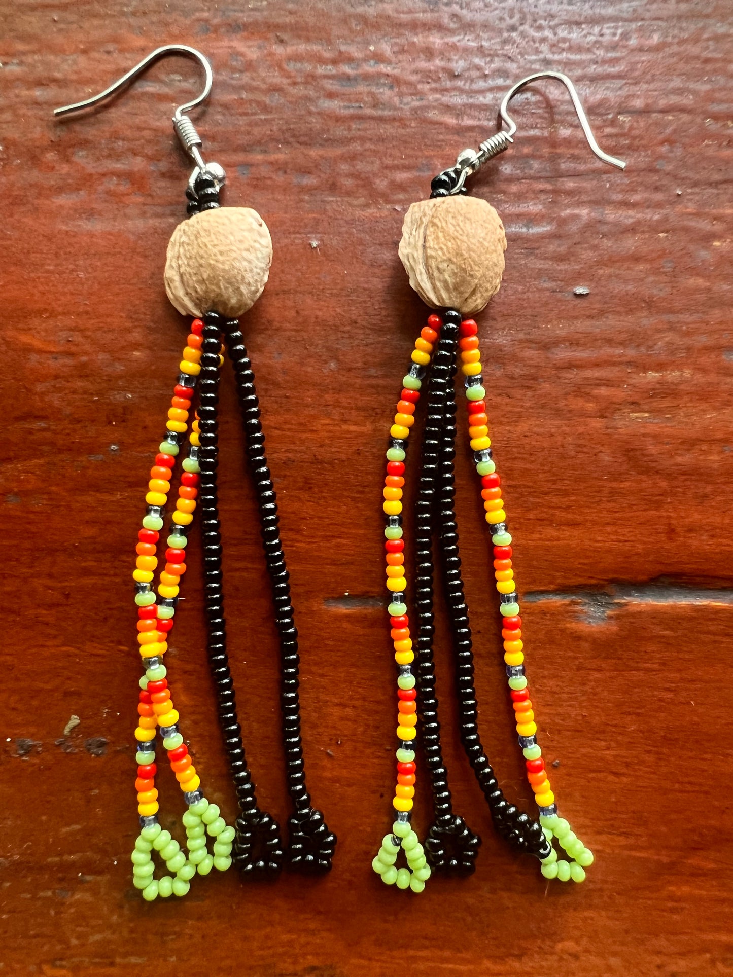 Long Cascabeles macho earrings Yanacona