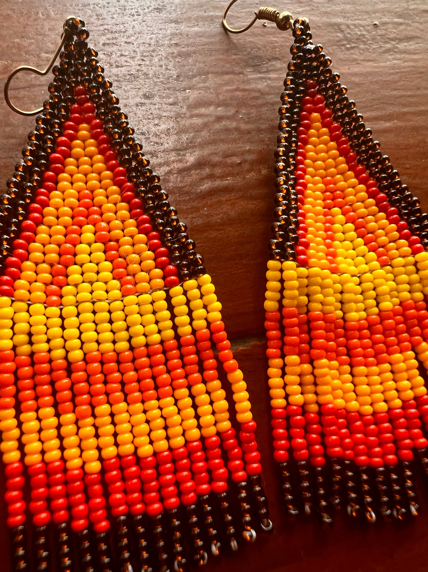 Rising fire triangle earrings Yanacona