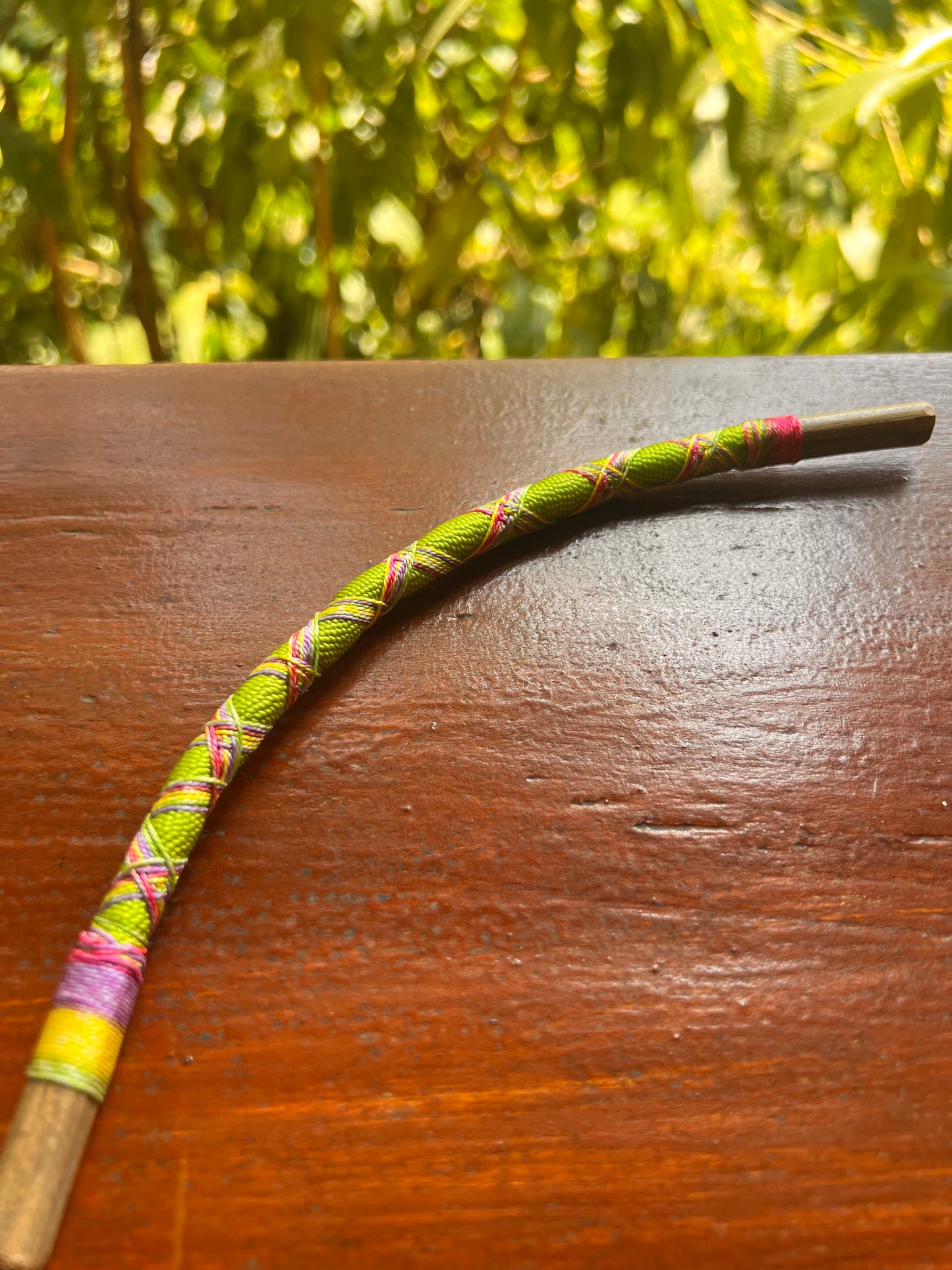 Light green bendable Bamboo Tepi with rainbow-colored patterns