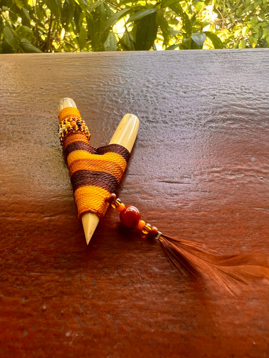 Brown-beige Bamboo Kuripe with feather and pearls