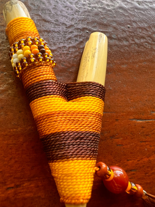 Brown-beige Bamboo Kuripe with feather and pearls