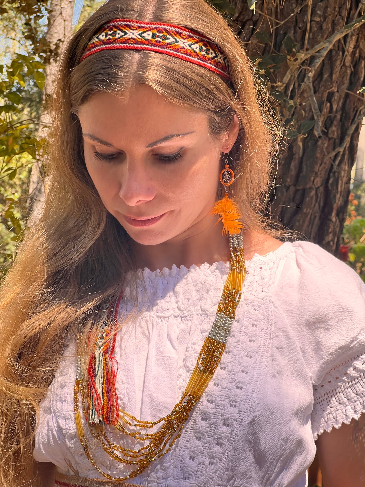 Orange feather earrings