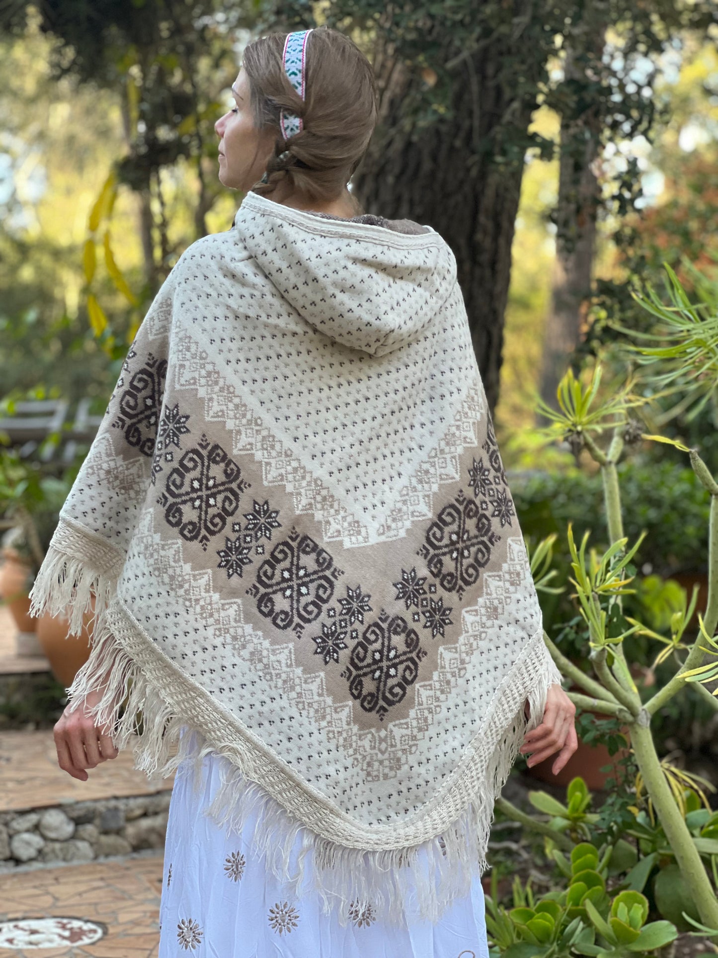 White autumn/spring poncho with brown patterns