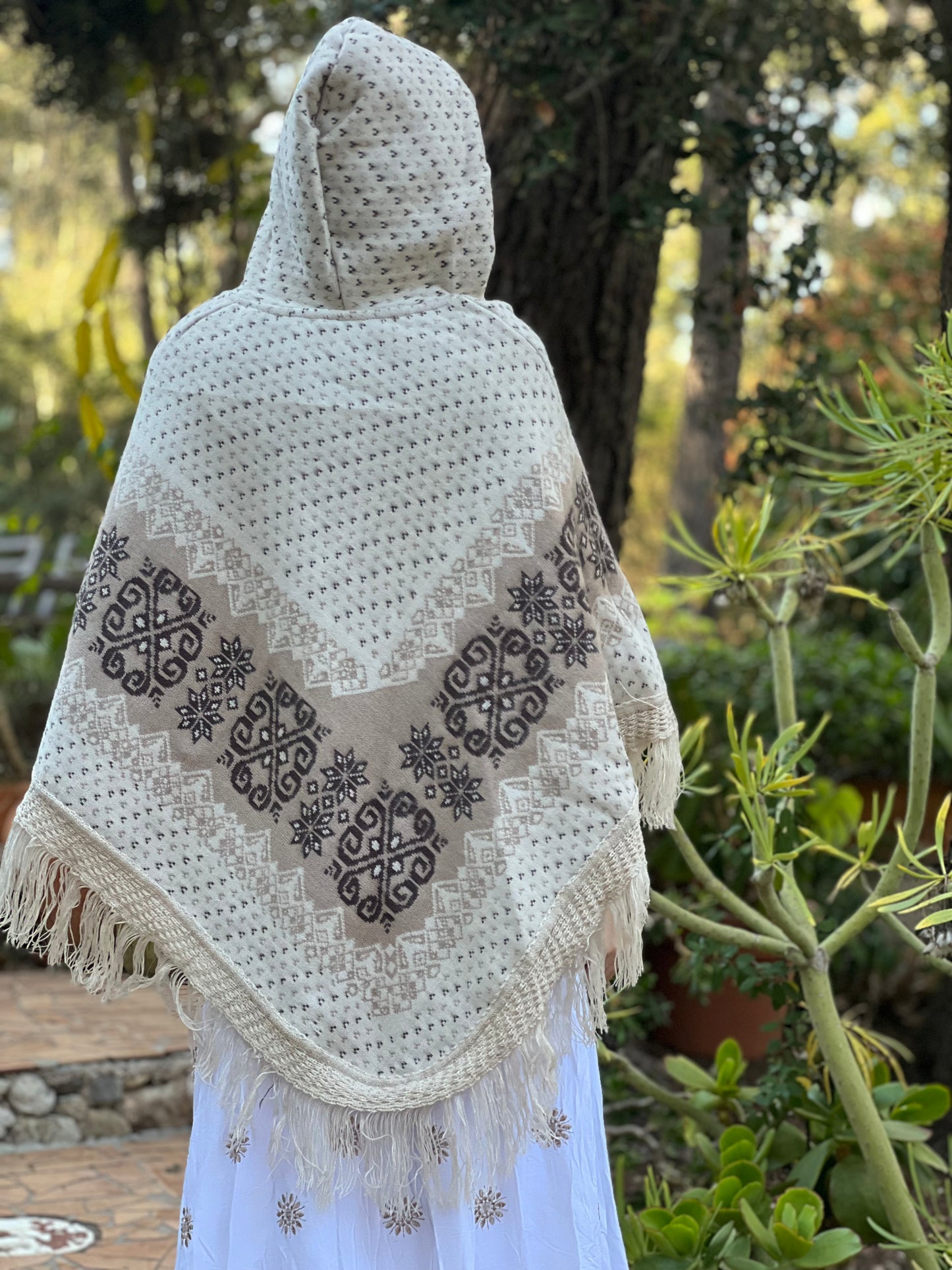 White autumn/spring poncho with brown patterns