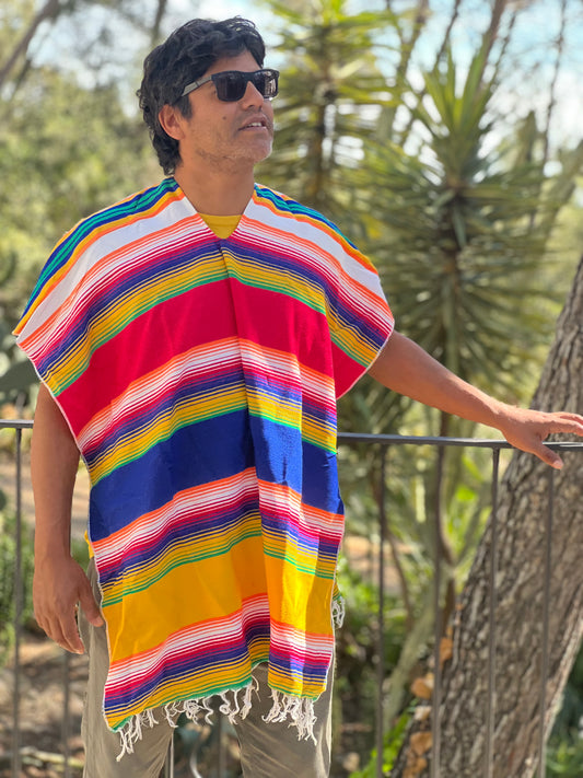 Rainbow coloured summer poncho