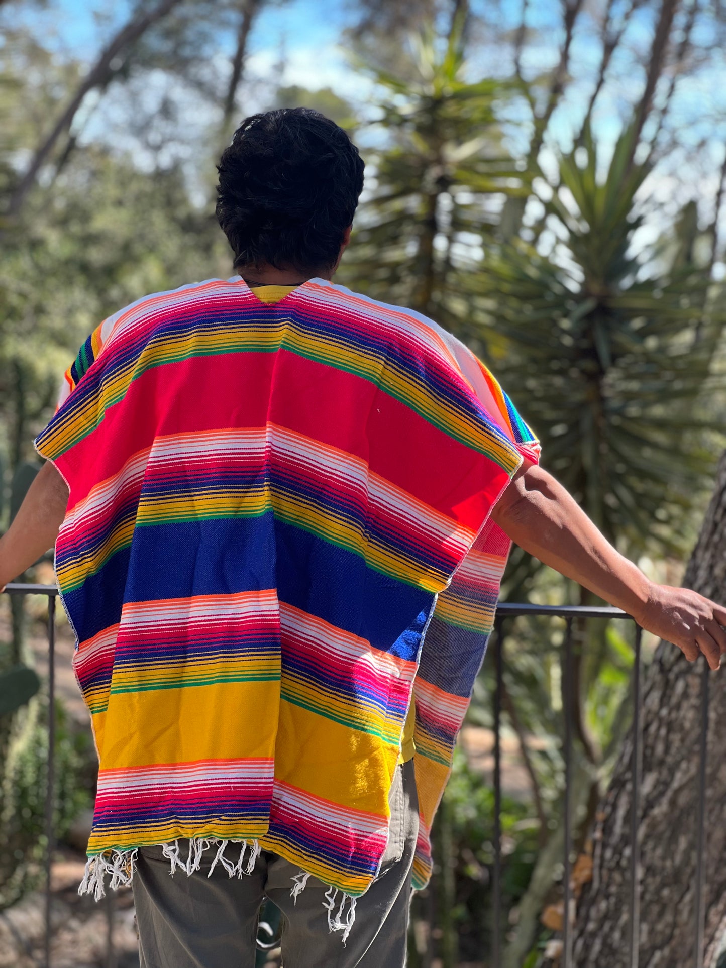 Rainbow coloured summer poncho