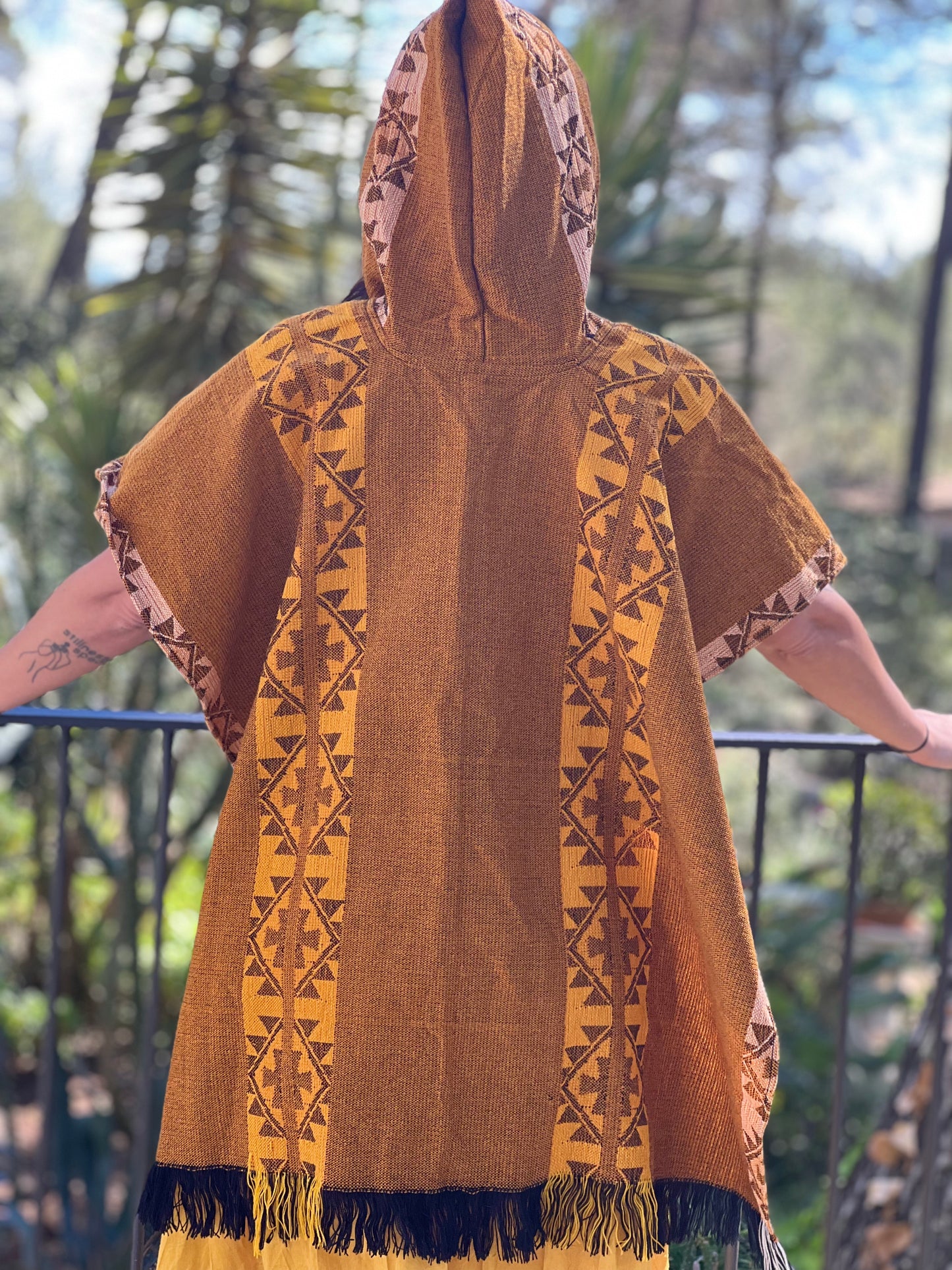 Yellow winter poncho