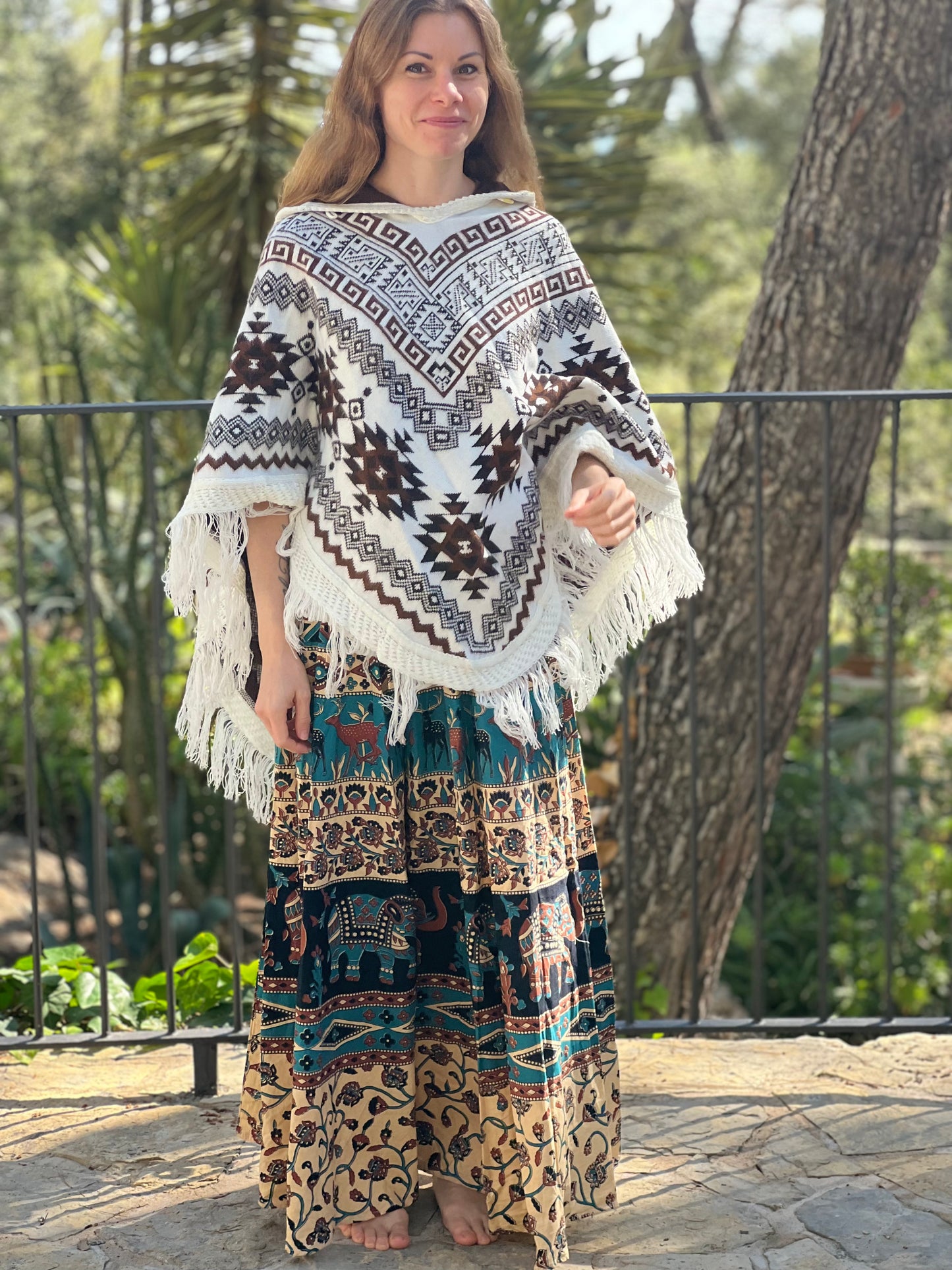 White winter poncho with brown patterns