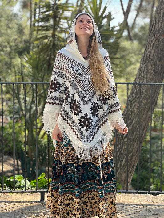 White winter poncho with brown patterns