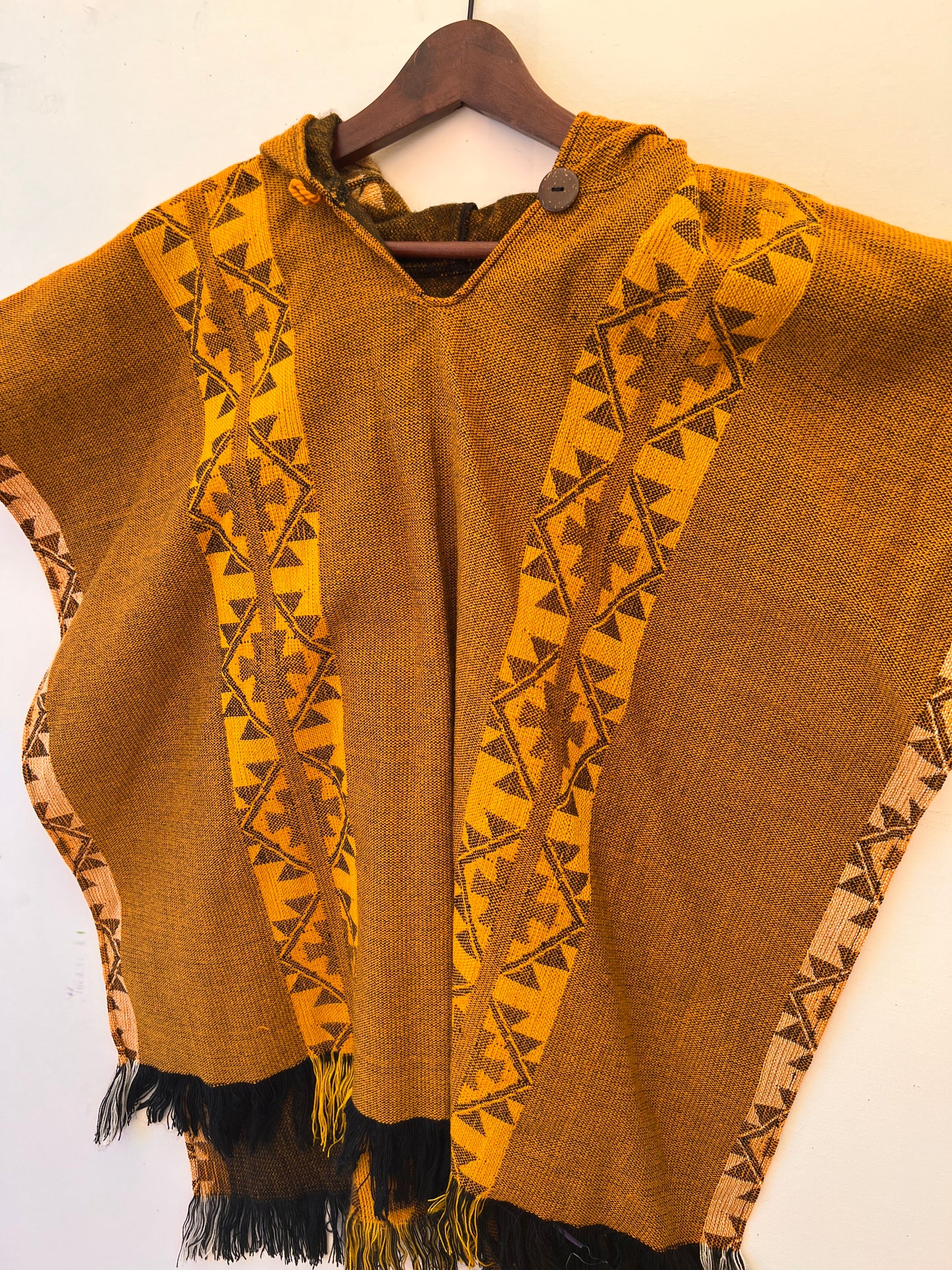 Yellow winter poncho