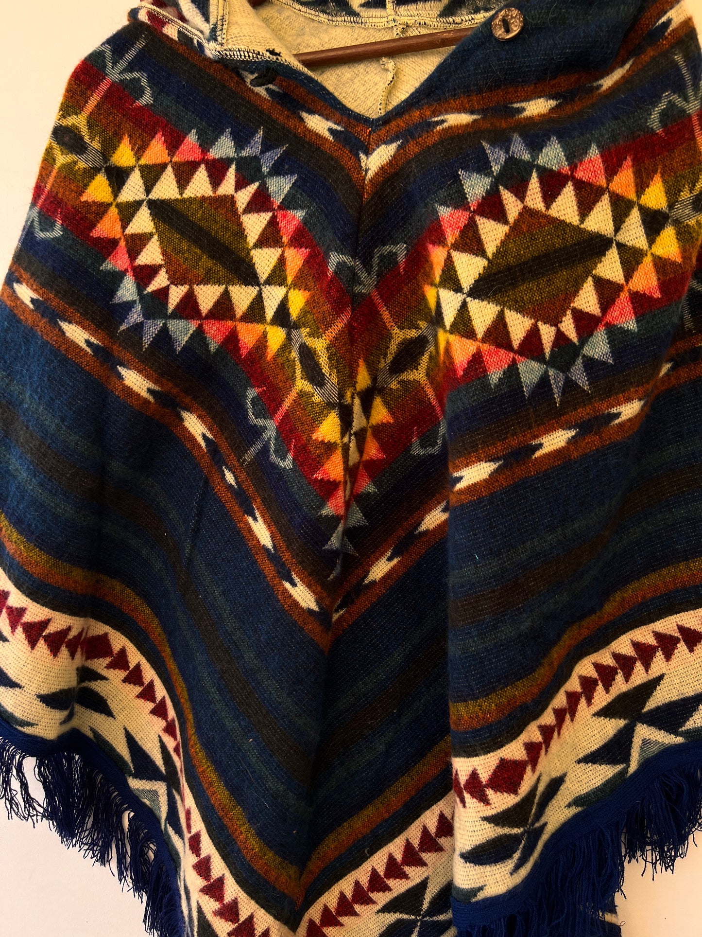 Dark blue winter poncho