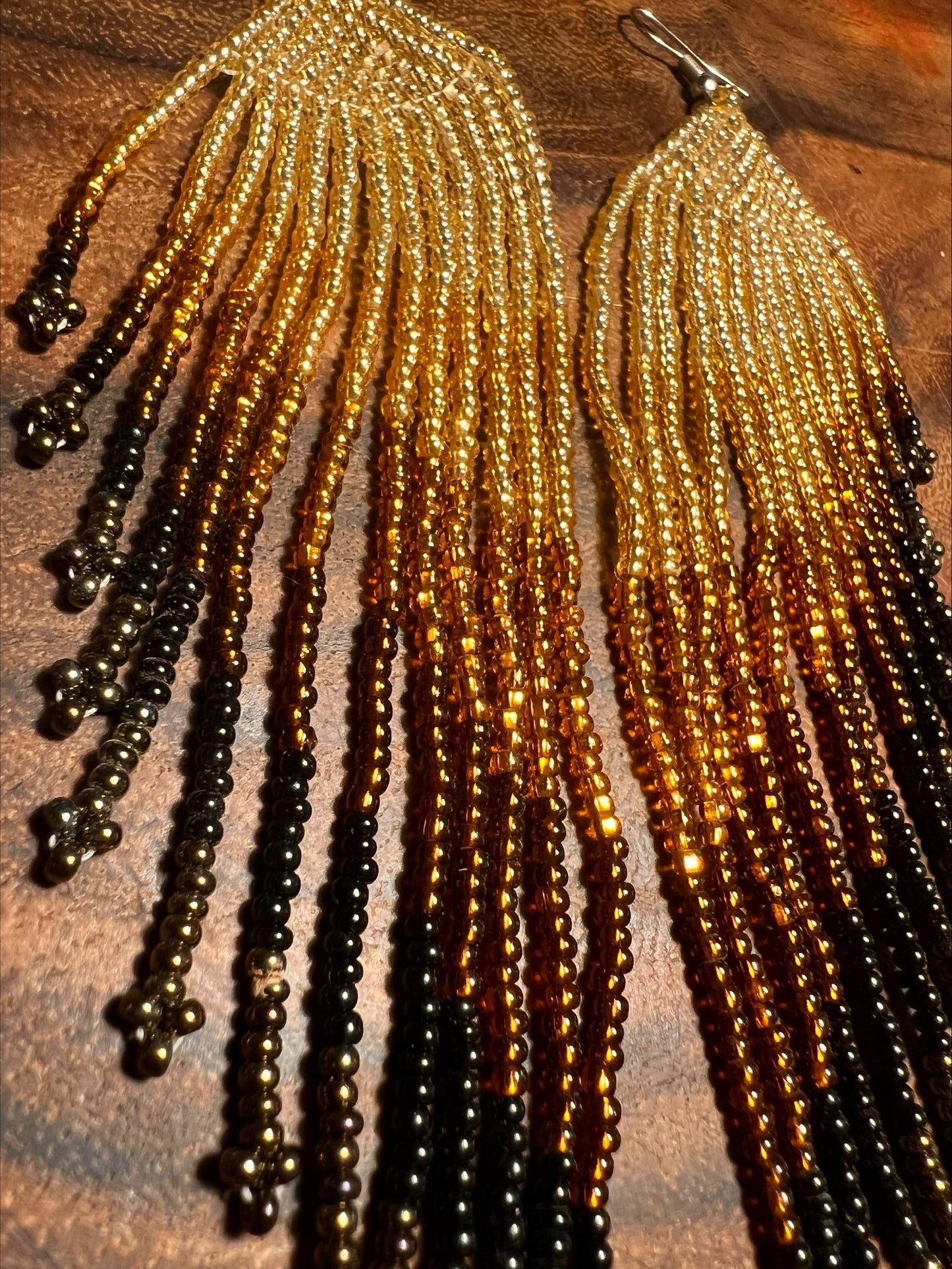 Long golden earth earrings