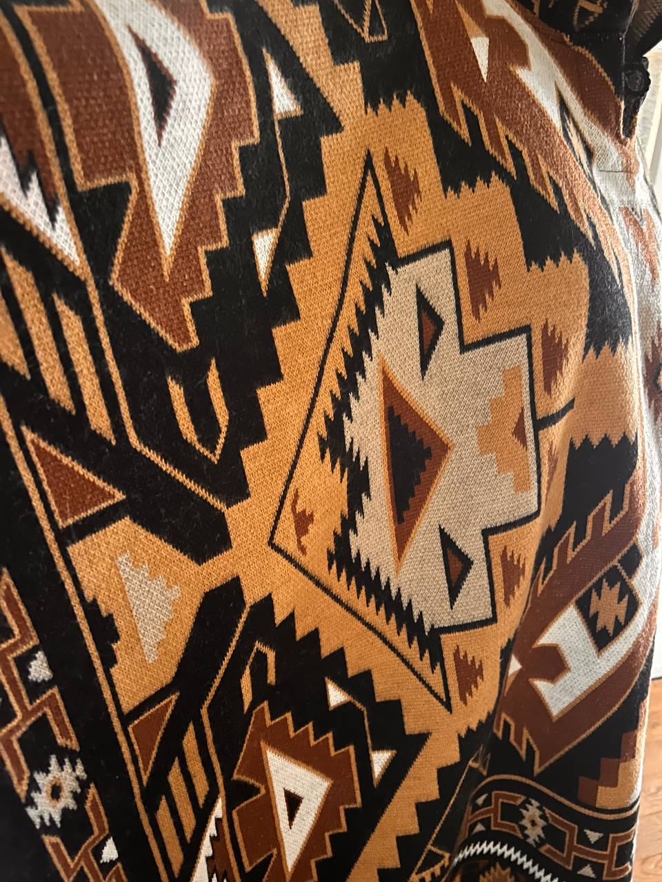 Brown-beige winter poncho with patterns