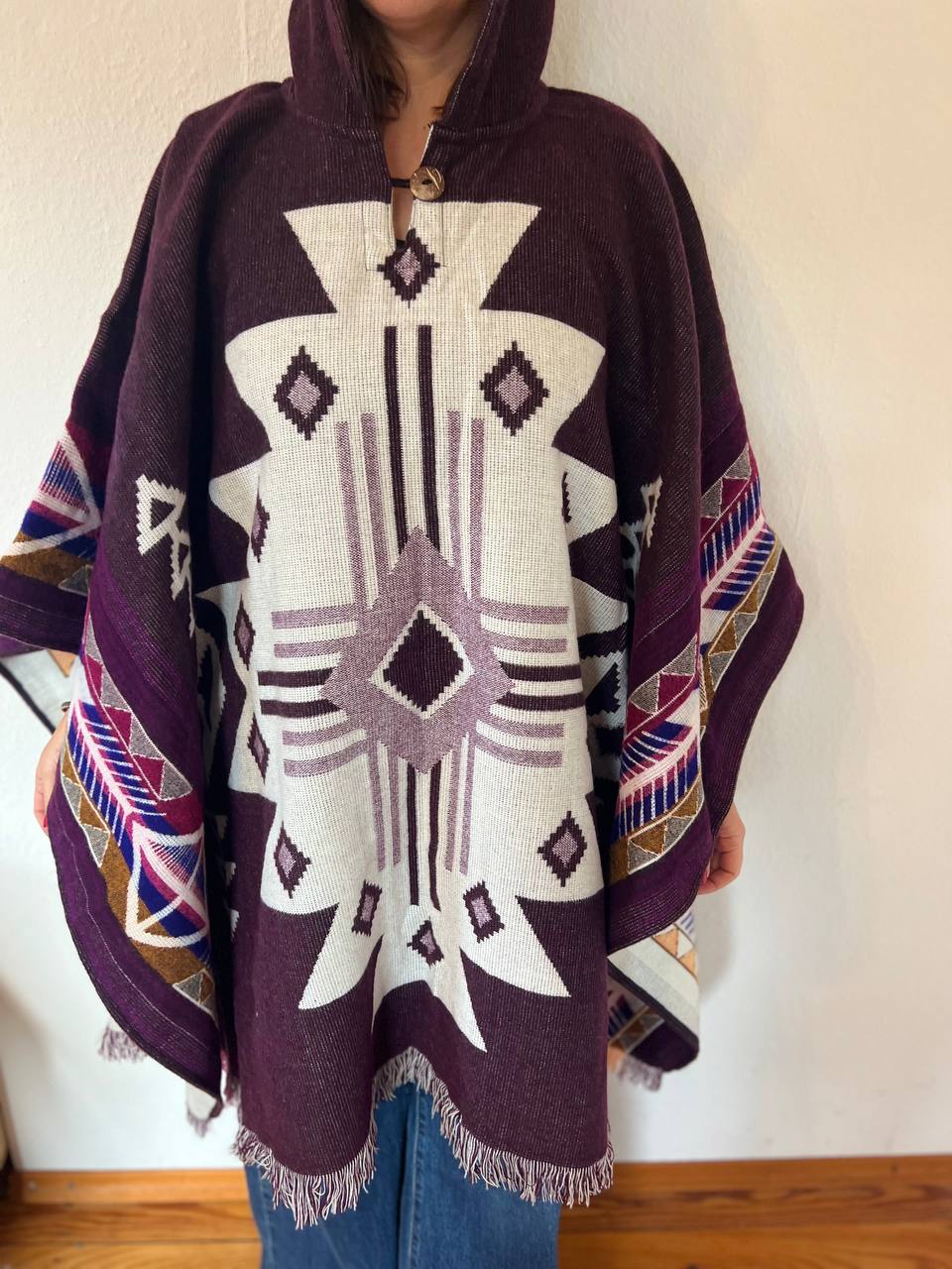 Purple white winter poncho