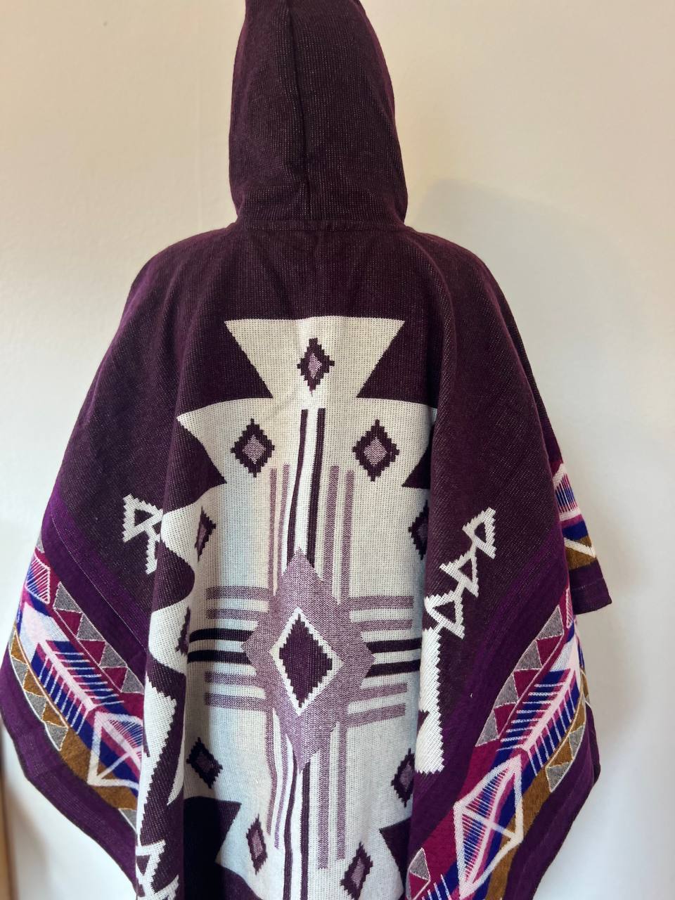 Purple white winter poncho
