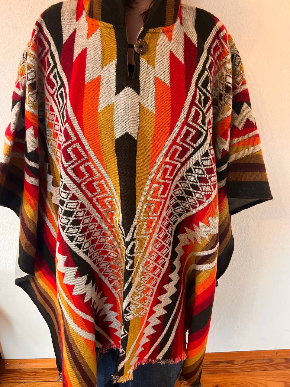 Multicoloured winter poncho