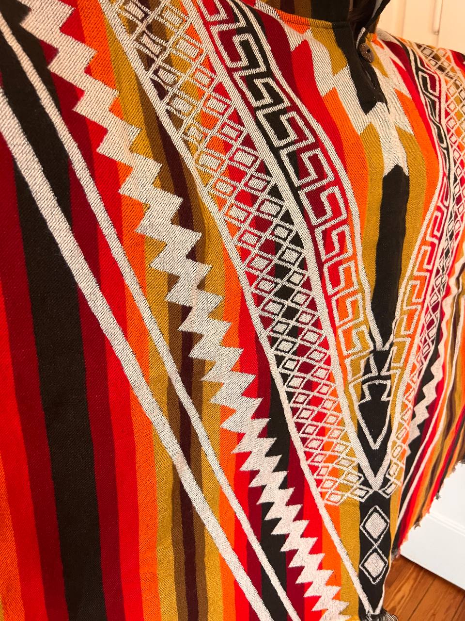 Multicoloured winter poncho