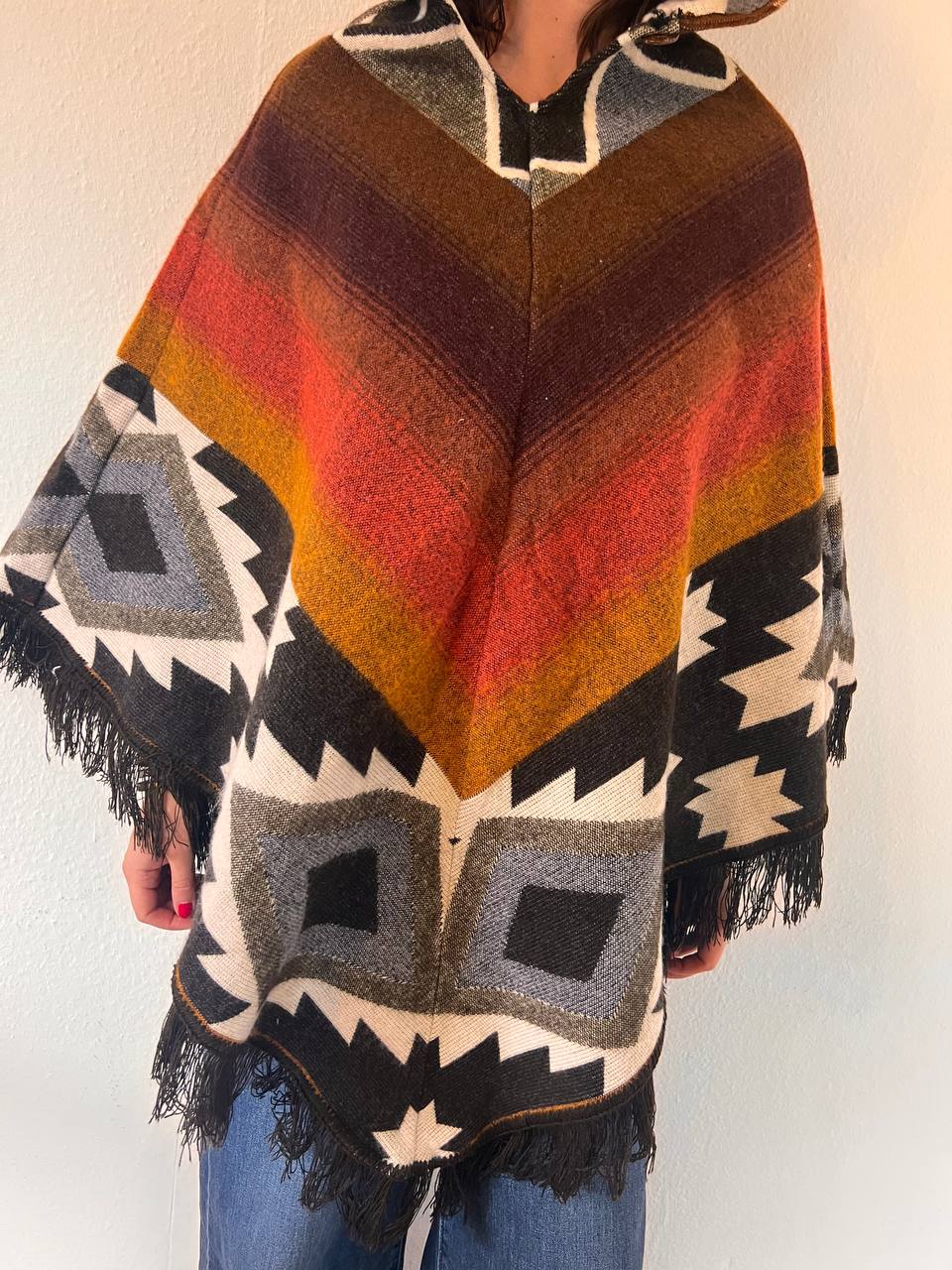 Earth tones winter poncho with patterns