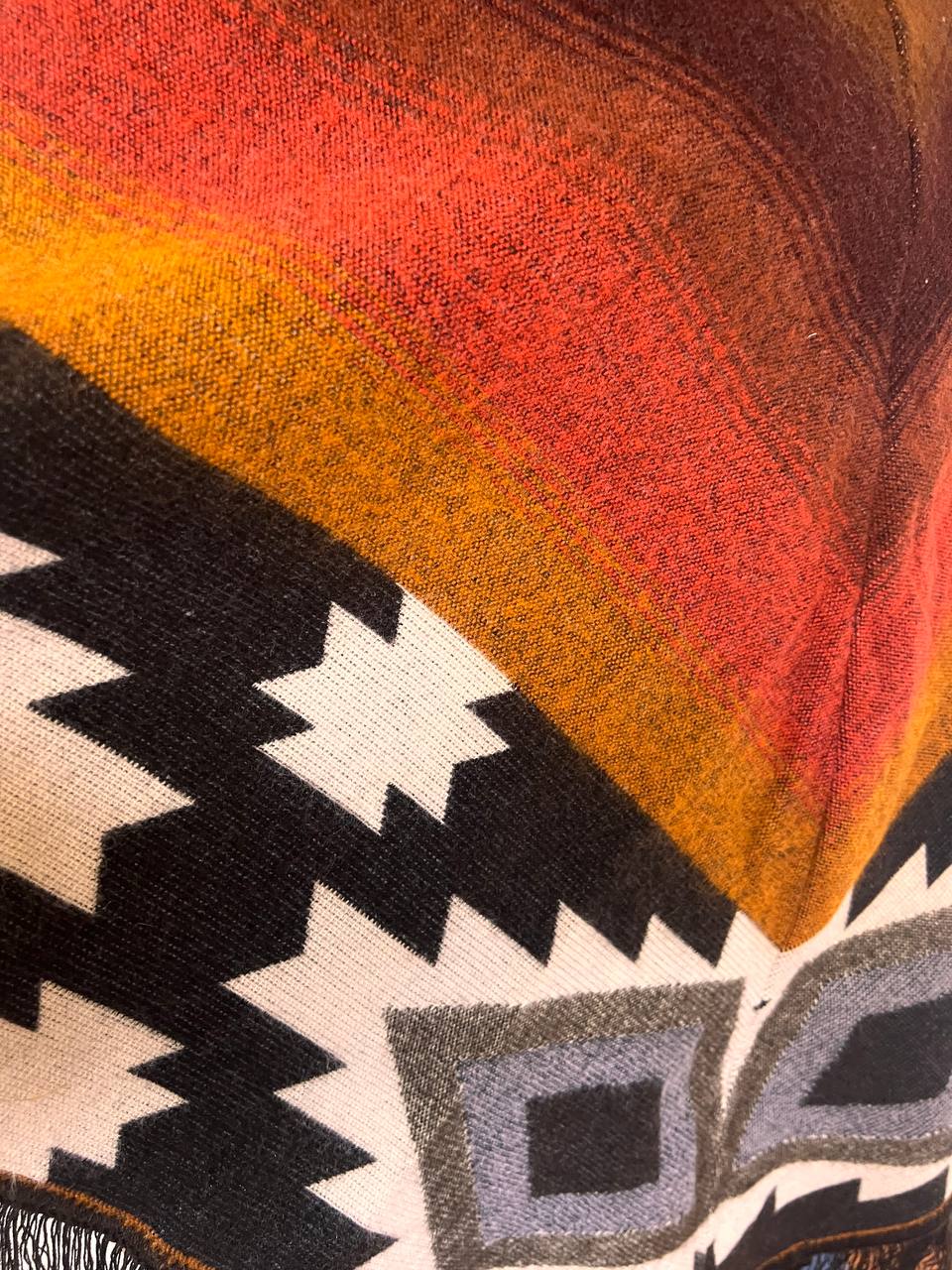 Earth tones winter poncho with patterns