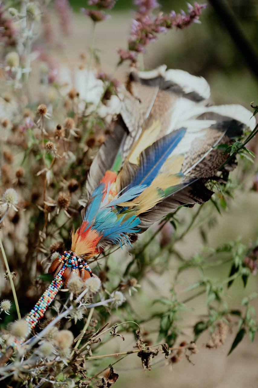 Feathers with rattle Cascabeles hembra