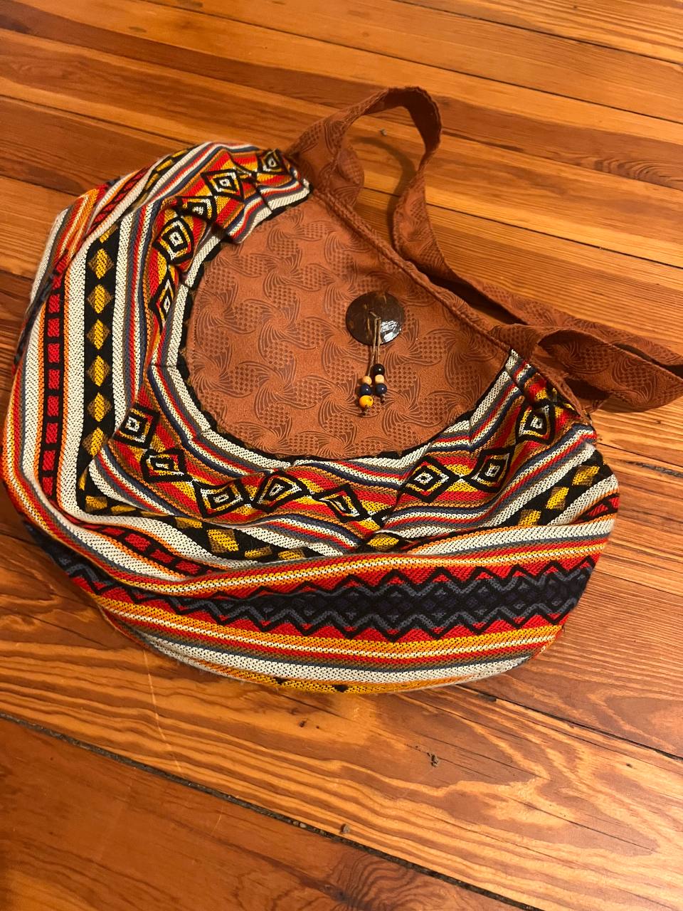 Round multicoloured hand bag